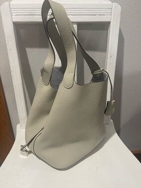 Pebbled Cream Shoulder Bag with Silver Lock Accent
